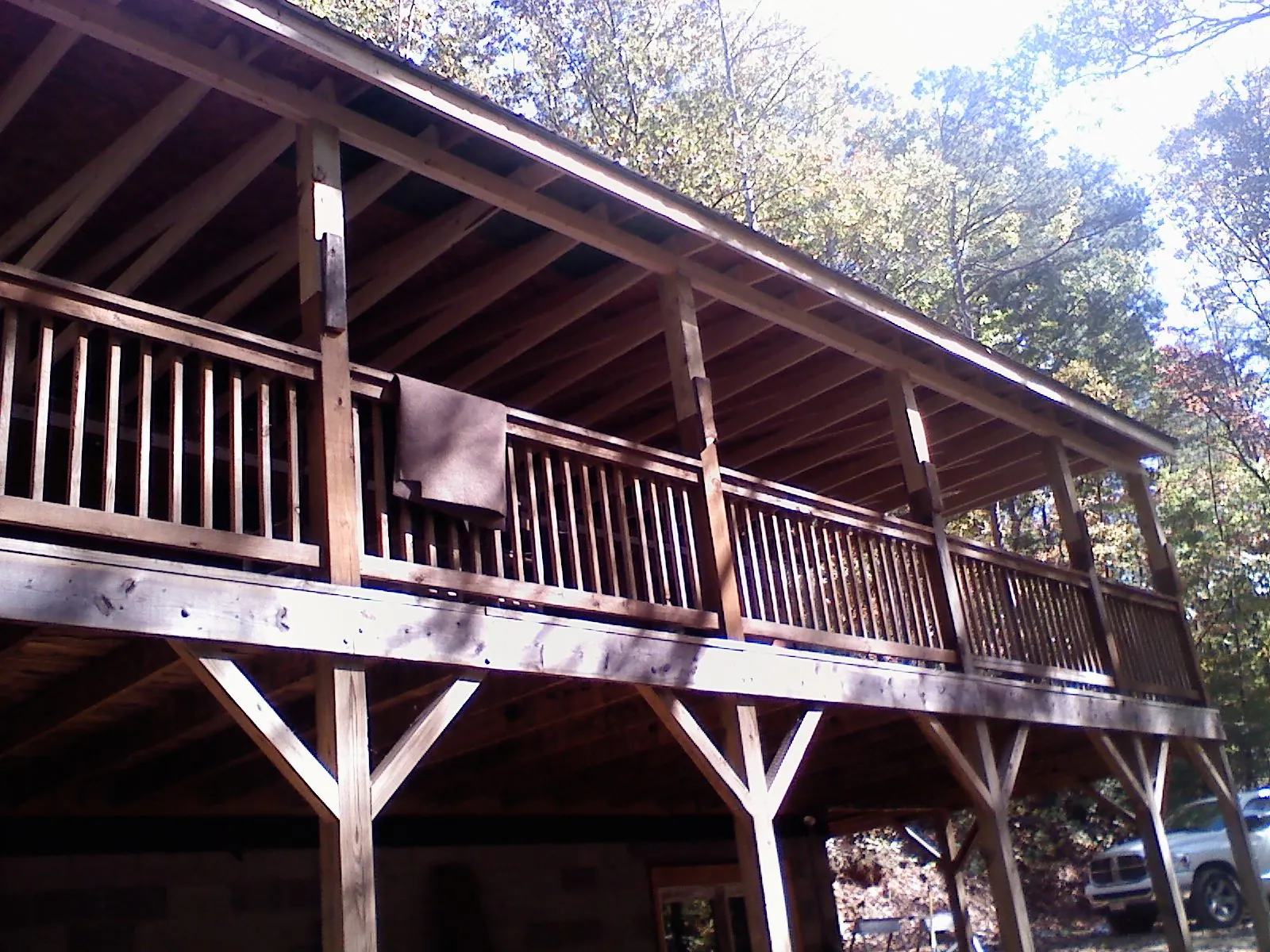 Timber framing under a new elevated porch and deck — Roof Leak Repair in Mineral Ridge by Roofing Brothers